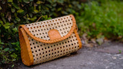 SOLANGE RATTAN AND LEATHER TRIM CLUTCH